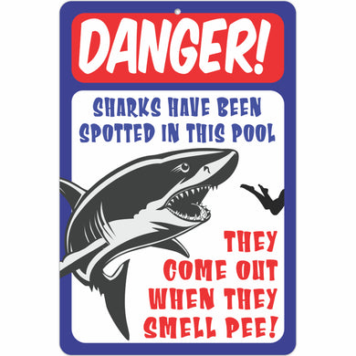 Danger! Sharks Have Been Spotted in This Pool. They Come Out When They Smell Pee!
